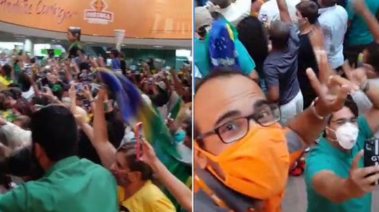 Imagem Vídeo: apoiadores recepcionam Bolsonaro no Aeroporto Zumbi dos Palmares